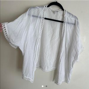 Sheer white swim coverup shawl with eyelet trim